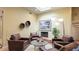 Living room featuring terra-cotta floors, recessed lighting, seating area, and fireplace at 5135 Riverwood Ave, Sarasota, FL 34231