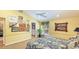 Cozy main bedroom features vaulted ceilings, natural light and charming decor at 5135 Riverwood Ave, Sarasota, FL 34231