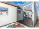 Enclosed back porch with screen and a view of the backyard at 6124 Green View Dr # 139, Sarasota, FL 34231