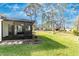 Enjoy the private backyard of this home with its lush green grass and peaceful screened-in porch at 6124 Green View Dr # 139, Sarasota, FL 34231