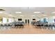 Spacious common room perfect for events, with large windows, drop ceiling, and tiled floors at 6124 Green View Dr # 139, Sarasota, FL 34231
