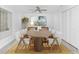 Elegant dining room with stylish table, seating for eight and modern decor at 6124 Green View Dr # 139, Sarasota, FL 34231