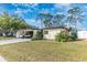 Charming single-story home with well-maintained lawn and driveway at 6124 Green View Dr # 139, Sarasota, FL 34231