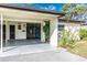 Inviting front entrance with covered parking and landscaping at 6124 Green View Dr # 139, Sarasota, FL 34231