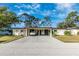 Charming single-story home with a covered carport and well-manicured lawn at 6124 Green View Dr # 139, Sarasota, FL 34231