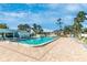 Community pool surrounded by a spacious patio area for residents to relax and enjoy the Florida sunshine at 6124 Green View Dr # 139, Sarasota, FL 34231