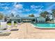 Community pool and clubhouse offer residents a place to gather and enjoy the Florida sunshine at 6124 Green View Dr # 139, Sarasota, FL 34231
