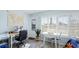 Bright bedroom with ample natural light from shuttered windows, providing a serene and cheerful living area at 6406 Auburn Ave, Bradenton, FL 34207