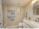 Cozy bathroom features a marble vanity top and neutral wall color at 6501 Stone River Rd # 205, Bradenton, FL 34203