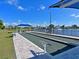 Scenic bocce ball court by the water, complete with benches and covered seating area at 6501 Stone River Rd # 205, Bradenton, FL 34203