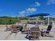 Inviting community patio with comfortable seating and shaded areas for relaxation and socializing at 6501 Stone River Rd # 205, Bradenton, FL 34203