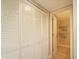Hallway with closet and bathroom access at 6501 Stone River Rd # 205, Bradenton, FL 34203