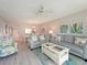 Inviting living room features soothing colors, comfortable seating, and tasteful décor at 6501 Stone River Rd # 205, Bradenton, FL 34203