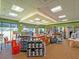 A well-organized golf shop with golfing gear displayed on shelves and racks with good natural and artifical light at 6501 Stone River Rd # 205, Bradenton, FL 34203