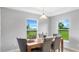 Bright dining area with backyard views offers a cozy space for gatherings and everyday meals at 128 Sequoyah Dr, Port Charlotte, FL 33954