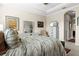 Inviting bedroom with neutral tones, modern dresser, and comfortable bed, ideal for restful nights at 13038 Prima Dr, Bradenton, FL 34211
