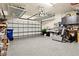 Spacious garage with ample storage, custom shelves, and overhead racks at 13038 Prima Dr, Bradenton, FL 34211