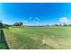 Scenic view of the golf course showing manicured green lawns and blue skies at 15209 Montello Way, Bradenton, FL 34211