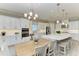 Elegant kitchen with stainless steel appliances, a center island, and a breakfast nook at 15209 Montello Way, Bradenton, FL 34211