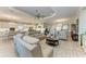 Bright living space connects to the kitchen and dining areas for easy entertaining at 15209 Montello Way, Bradenton, FL 34211