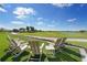 Seating area featuring lounge chairs on the lawn overlooking the golf course at 16435 Umbria Pl, Bradenton, FL 34211