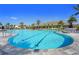 A resort-style pool with lap lanes surrounded by lounge chairs and verdant community landscaping at 16435 Umbria Pl, Bradenton, FL 34211