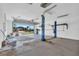 Spacious garage with two car lifts, offering functionality and convenient access to the outdoors at 1950 Fairview Dr, Englewood, FL 34223