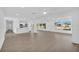 Spacious living room with wood flooring, recessed lighting, and open floor plan at 1950 Fairview Dr, Englewood, FL 34223