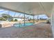 Beautiful screened pool area with room for entertaining; creating a resort-style relaxation space at 1950 Fairview Dr, Englewood, FL 34223