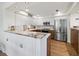 Modern kitchen with stainless steel appliances and granite countertops at 2012 Harbourside Dr # 2104, Longboat Key, FL 34228