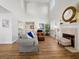 Bright living room with high ceilings, fireplace, and wood floors at 2012 Harbourside Dr # 2104, Longboat Key, FL 34228