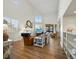 Bright living room with vaulted ceiling and wood floors at 2012 Harbourside Dr # 2104, Longboat Key, FL 34228