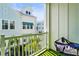 Charming balcony view with artificial turf and a relaxing hammock chair at 2505 Boone Ct, Sarasota, FL 34237