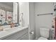 Cute bathroom with a playful, colorful shower curtain and modern vanity at 2505 Boone Ct, Sarasota, FL 34237