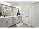 Elegant bathroom with double vanities, modern fixtures, and a spacious shower at 2505 Boone Ct, Sarasota, FL 34237