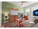 Cozy home office space with a stylish murphy bed and ample natural light at 2505 Boone Ct, Sarasota, FL 34237