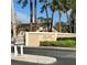 Street view of the Pinewood Village community sign on Woodgate Lane at 2607 Woodgate Ln # K9, Sarasota, FL 34231