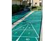 Enjoy a game on the outdoor shuffleboard court at this charming condo community at 2607 Woodgate Ln # K9, Sarasota, FL 34231