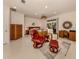 Inviting bedroom with seating area, ceiling fan, and sliding glass doors at 333 Bayshore Dr, Venice, FL 34285