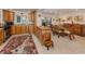 Bright kitchen with wooden cabinets, stainless steel appliances, and adjacent dining area at 333 Bayshore Dr, Venice, FL 34285