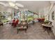 Enclosed patio offering plenty of seating and views of the surrounding landscaping at 333 Bayshore Dr, Venice, FL 34285