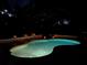 Illuminated pool in the night at 3610 Garden Lakes Clenet, Bradenton, FL 34203