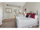 Spacious bedroom with neutral walls, plush carpeting, and ensuite bathroom access at 3803 54Th W Dr # 203, Bradenton, FL 34210