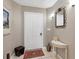 Inviting condominium foyer with neutral tones, decorative mirror and tasteful accents at 3803 54Th W Dr # 203, Bradenton, FL 34210