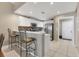 Modern kitchen featuring white cabinets, quartz countertops, and stainless steel appliances at 3803 54Th W Dr # 203, Bradenton, FL 34210
