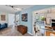 Hallway with light blue walls and decorative shelving showcasing a variety of home decor at 4062 S Shade Ave, Sarasota, FL 34231