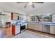 Well-lit kitchen featuring stainless steel appliances and a view to the outside at 4062 S Shade Ave, Sarasota, FL 34231