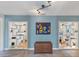 Stylish living space featuring unique shelving units and a distinctive trunk centerpiece at 4062 S Shade Ave, Sarasota, FL 34231