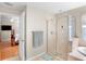 Primary bathroom featuring a spacious glass shower and bright natural light at 4110 Noble Pl, Parrish, FL 34219