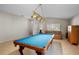 Bright game room featuring a blue billiards table and neutral décor at 4110 Noble Pl, Parrish, FL 34219